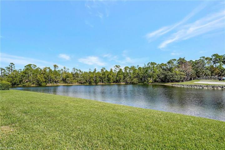 Lake with golf course view