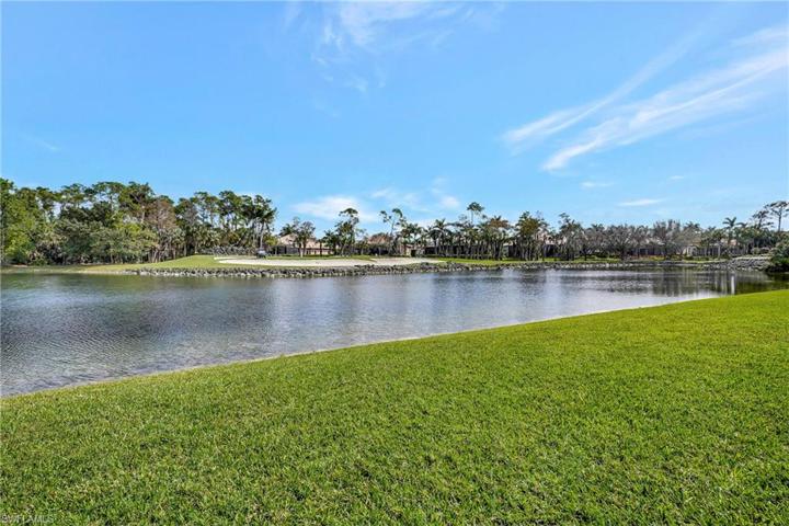 Lake with golf course view