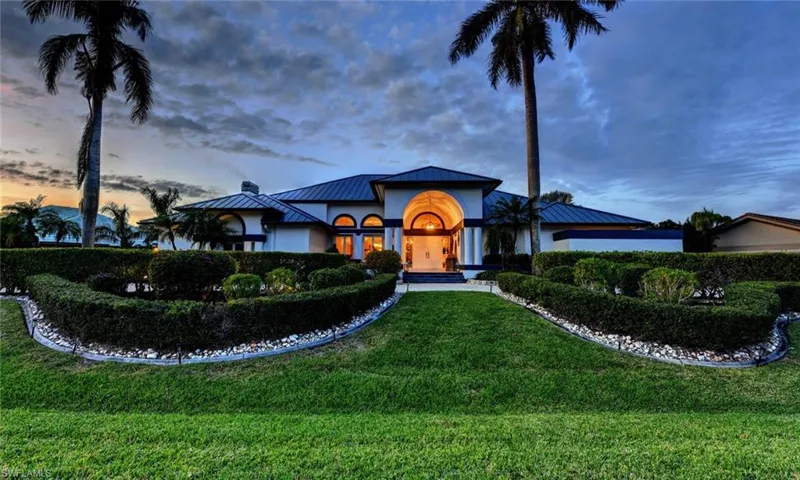 View of front of home at dusk.