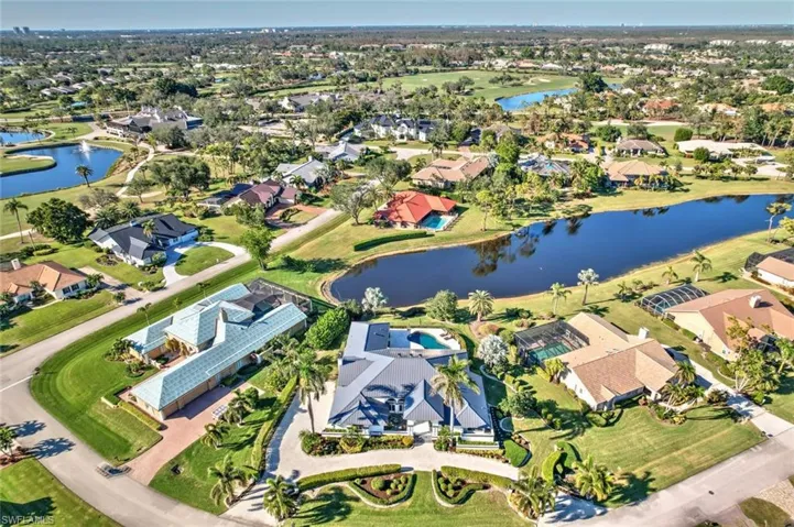 Aerial view of the home overlooking long lake views.