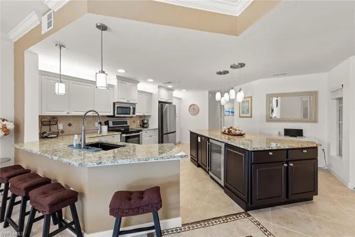 Breakfast bar and Island with Wine Cooler!