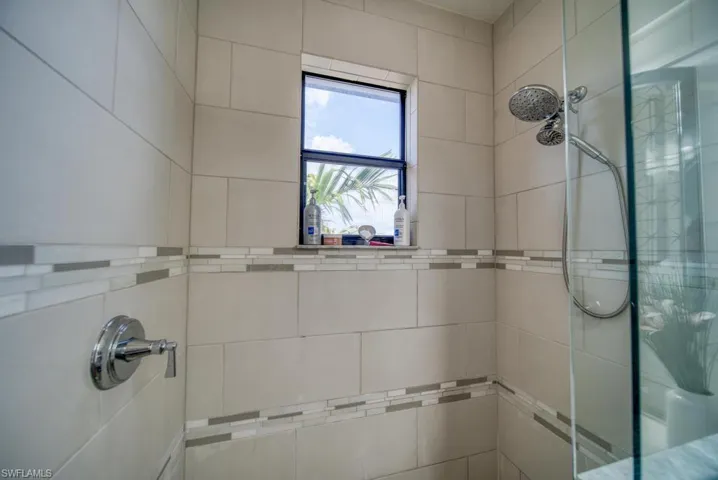 Bathroom with tiled shower