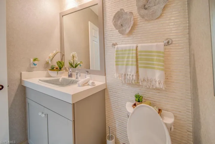 Bathroom featuring toilet and vanity