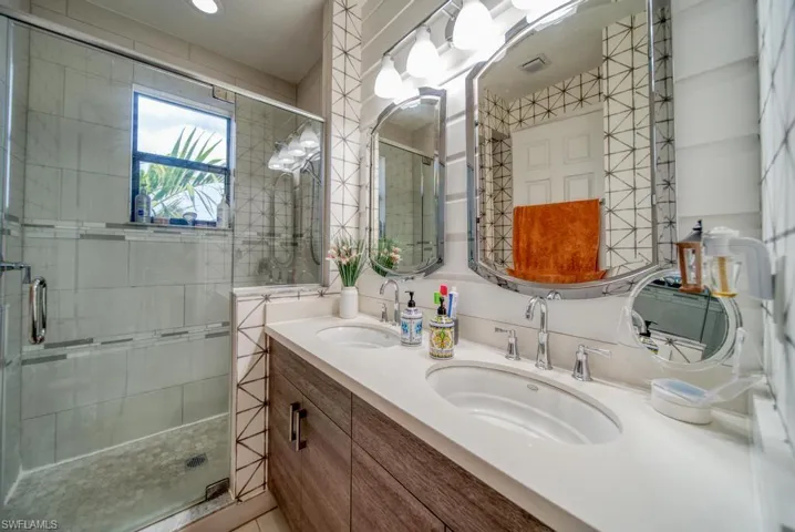 Bathroom with vanity and walk in shower