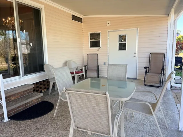 View of patio with outdoor dining space