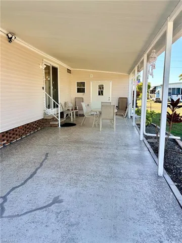 View of patio with outdoor dining space