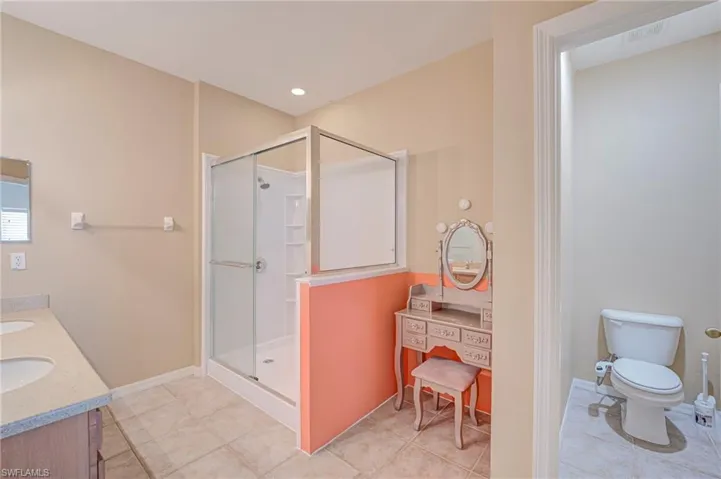 En suite bathroom with walk in shower