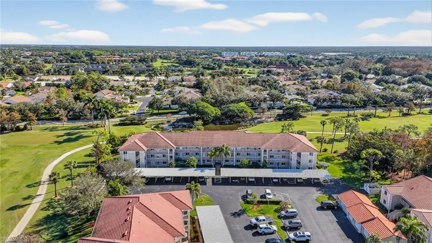 Aerial view of a golf club and apartment complex / building