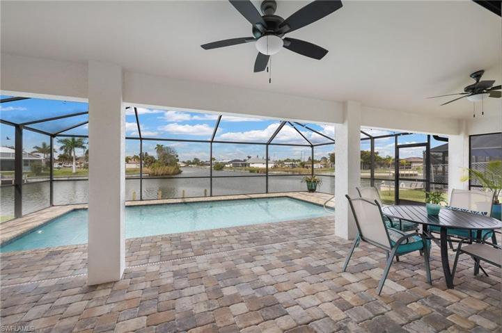 Relax poolside while enjoying the peaceful waterfront views