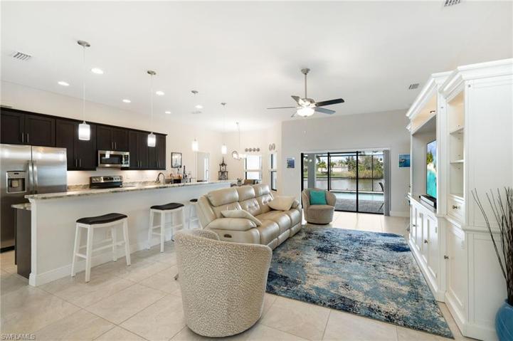 An open concept kitchen & living room is perfect for entertaining & relaxing