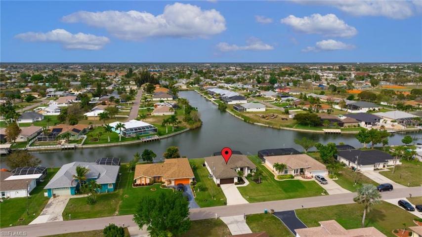 Intersecting canals give this home more waterfront than the neighbors