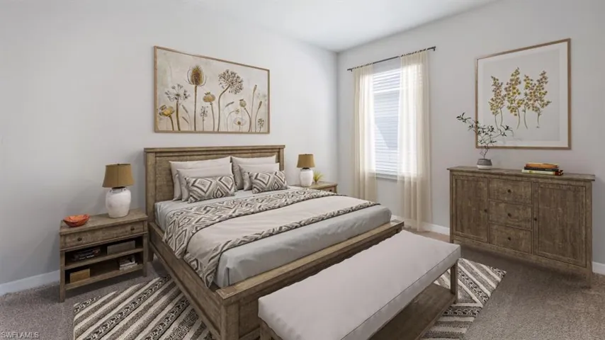 This image is virtually staged. Carpeted bedroom with baseboards