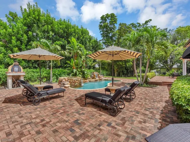 View of patio / terrace with an outdoor fireplace