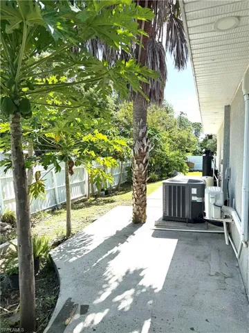 Fenced backyard featuring a patio