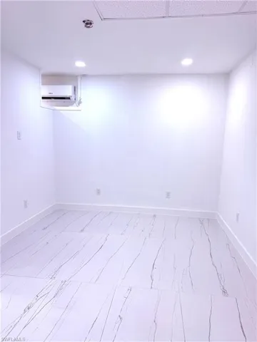 Finished below grade area with recessed lighting