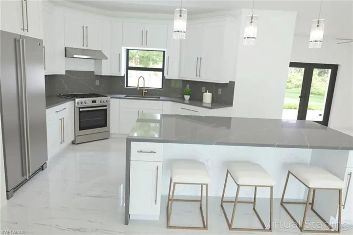 Spare room featuring recessed lighting, ceiling fan, and light marble finish flooring