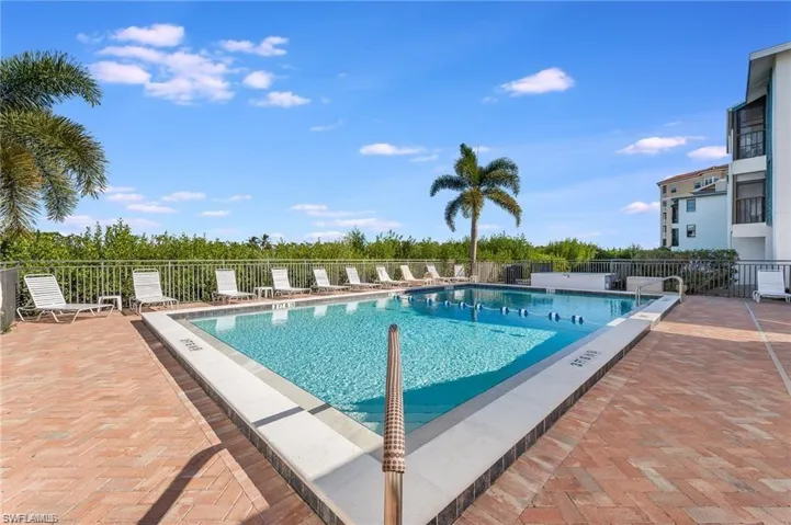 View of swimming pool with a patio
