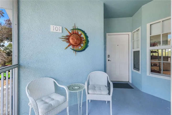 Property entrance with a balcony