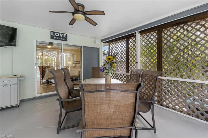 Screened-in Lanai with pocketing sliding glass door to Master Bedroom.