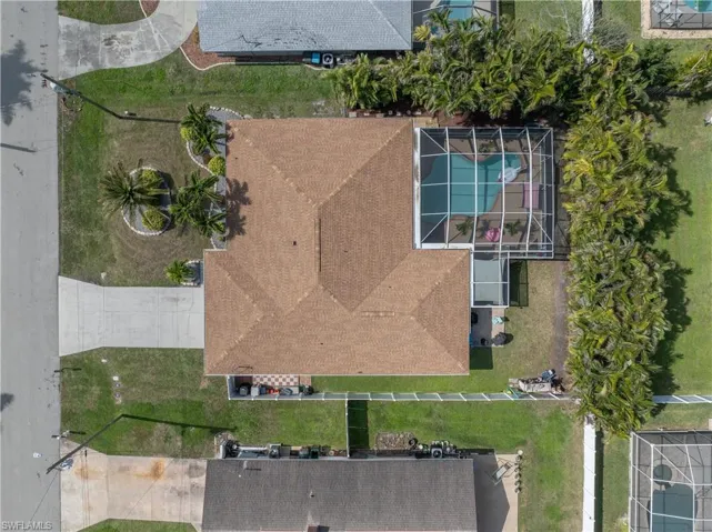 Overhead view of home with new shingle  roof in May 2023