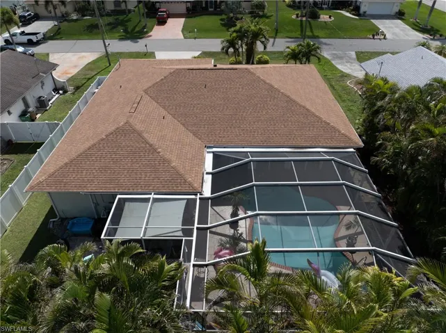 Aerial view of the back of the home/pool area