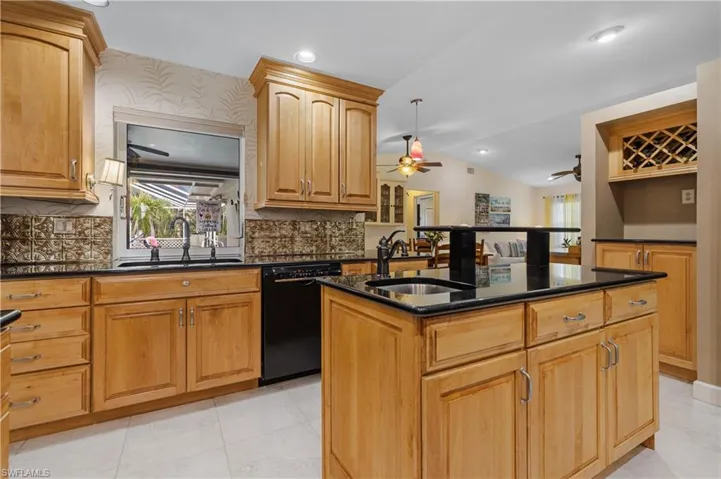 Kitchen with sliding service window out to Lanai