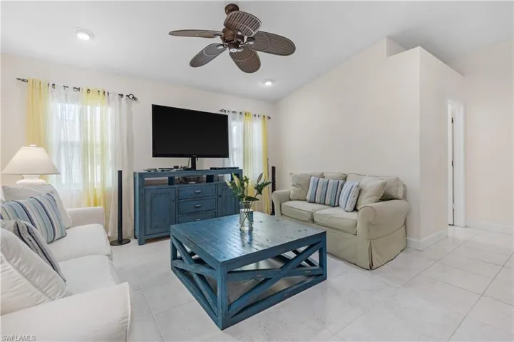 Family Room with doorway to Laundry Room and Garage on right