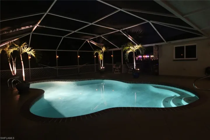 Nighttime view of pool area from the Lanai