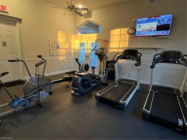 Workout area featuring ceiling fan