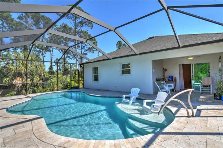 View of pool featuring a lanai and a patio