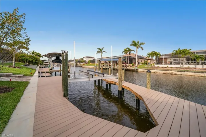 View of dock featuring a water view and boat lift