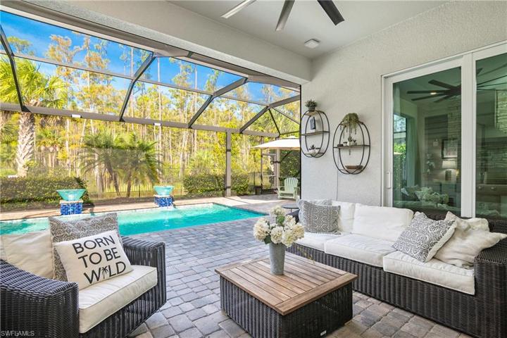 Enjoy friends and family while poolside in this comfy space.