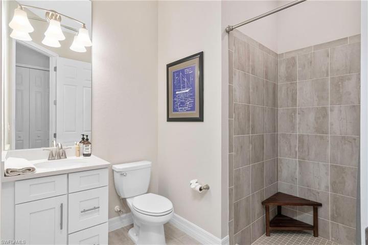 Ensuite Guest Bath features a walk-in shower.
