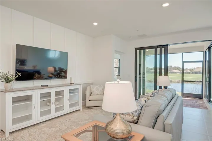Family room featuring recessed lighting and a water view