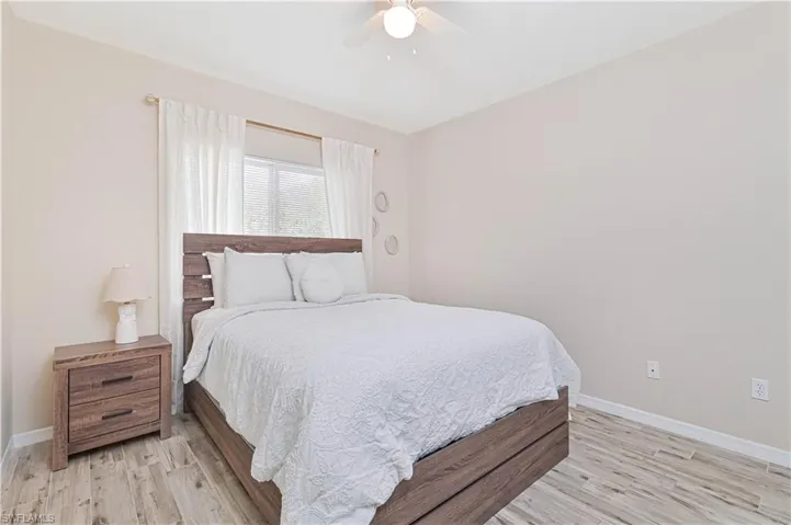 Bedroom featuring light wood-style floors and ceiling fan