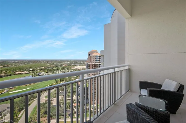 Balcony off guest bedroom featuring view of eastern sky.