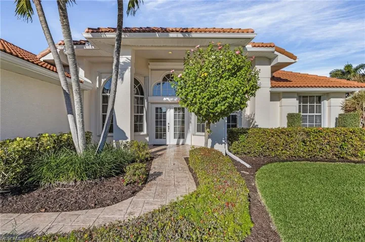 Mediterranean / spanish home with french doors