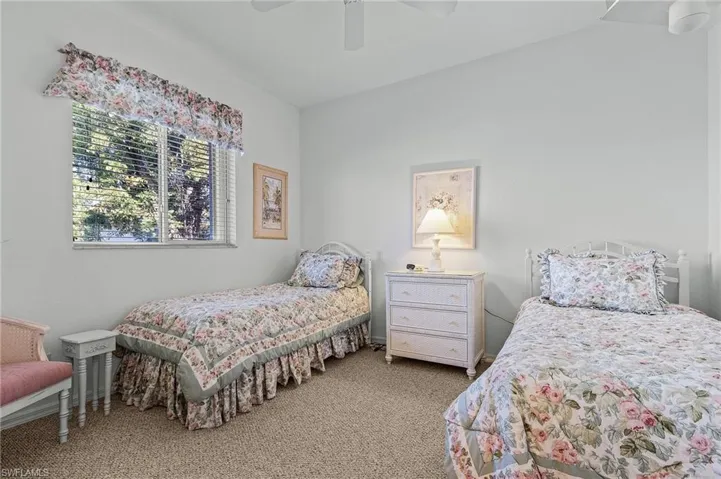 Carpeted bedroom #3 featuring ceiling fan