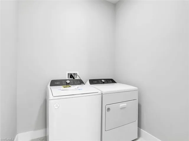 Laundry room with separate washer and dryer