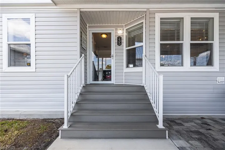 Entrance to property with a porch