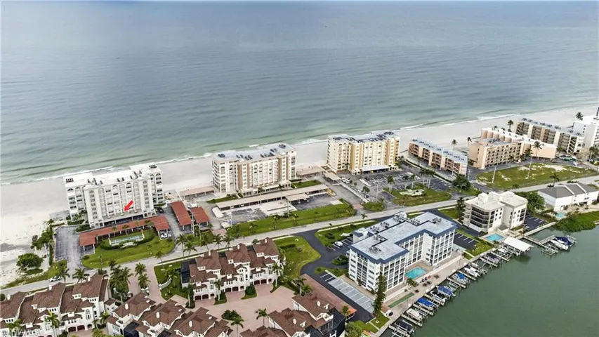 Bird's eye view of a large body of water and apartment complex