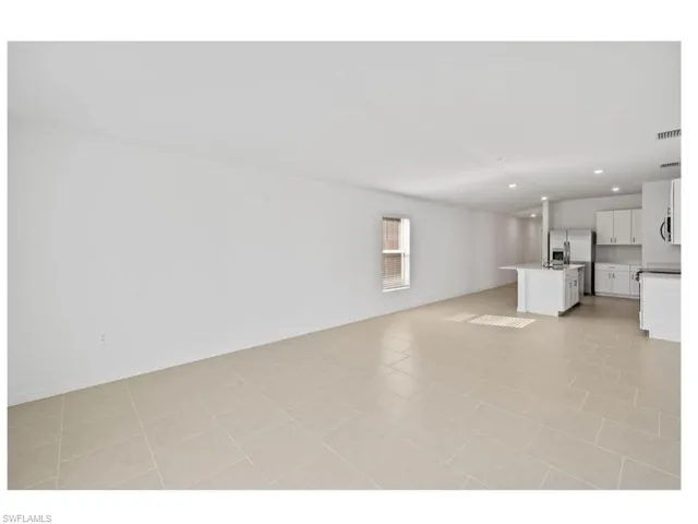 Spacious open living area with abundant natural light.
