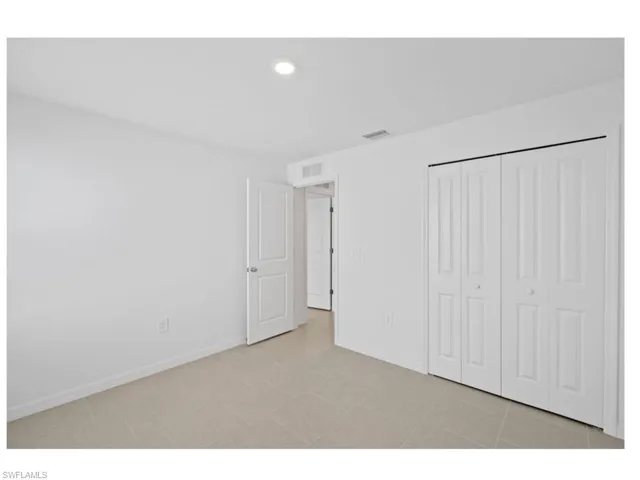 Spacious primary suite with walk-in closet.