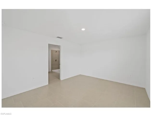 Comfortable guest bedroom with generous space