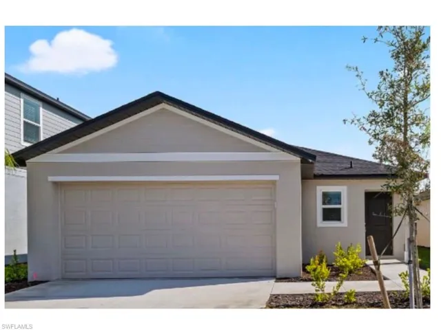 Beautiful front elevation with two-car garage.