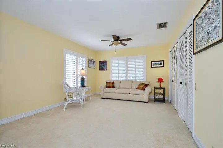Guest bedroom with plenty of closet space.