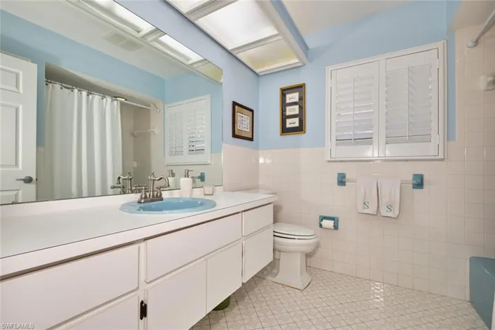 Guest bath has a great retro vibe.