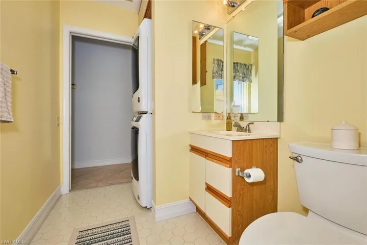 Half bath with access out to the pool.