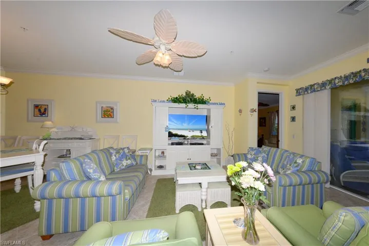 Spacious Great-room  Features 20" diagonal tile flooring, 10' ceilings, 8' doorways, Crown molding & more!