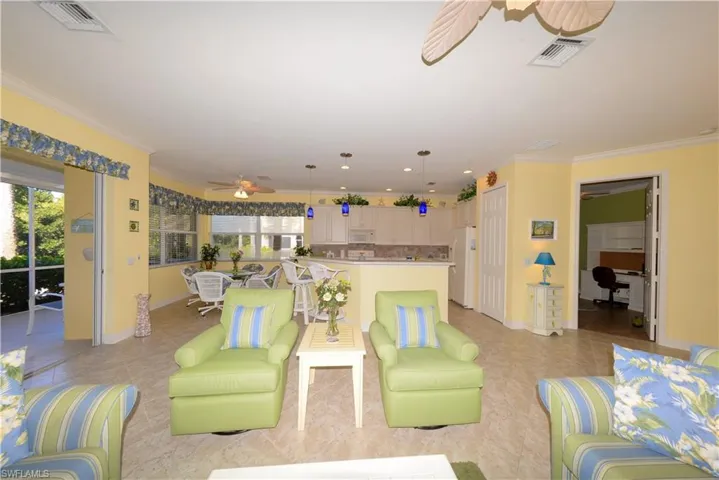 Spacious Great-room  Features 20" diagonal tile flooring, 10' ceilings, 8' doorways, Crown molding & more!